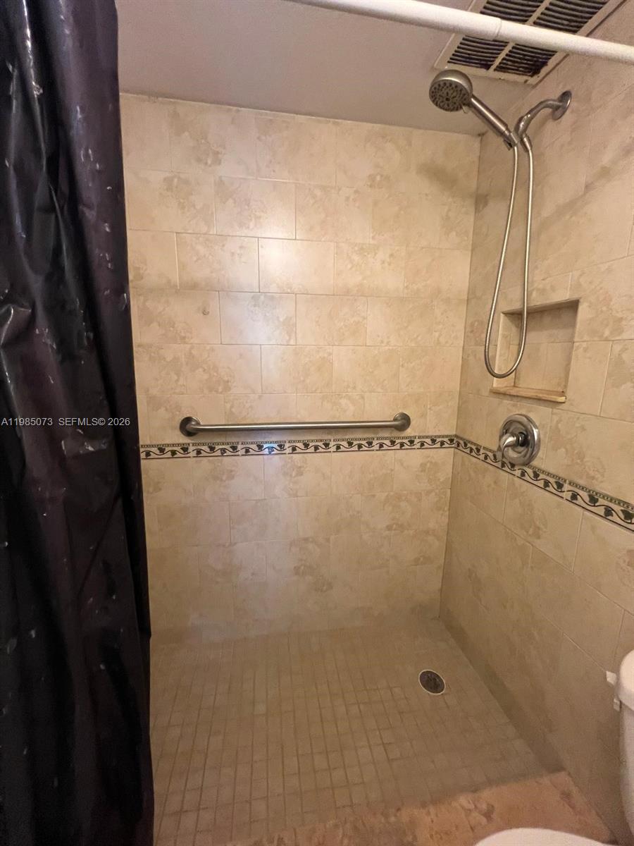 1900 West 68th Street, Unit D207 Hialeah, FL 33014 - Photo 23 of 33 a bathroom with a shower