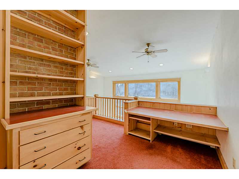 746 Middlebridge Road South Kingstown, RI 02879 - Photo 21 of 25 Studio/Study/Office. storage drawers, bookcases and desk