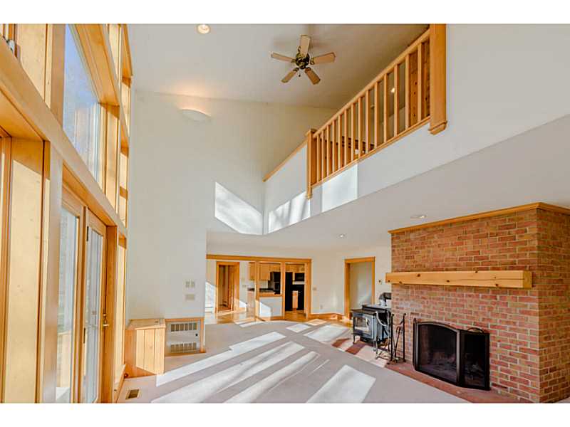 746 Middlebridge Road South Kingstown, RI 02879 - Photo 6 of 25 Living Room. View from living room towards kitchen