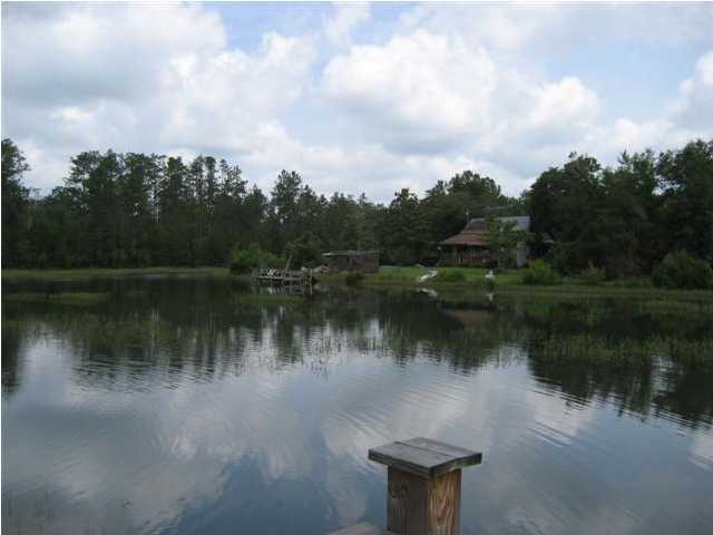 Tba Dove Run Road Holt, FL 32564 - Photo 2 of 6 a lake view with a lake