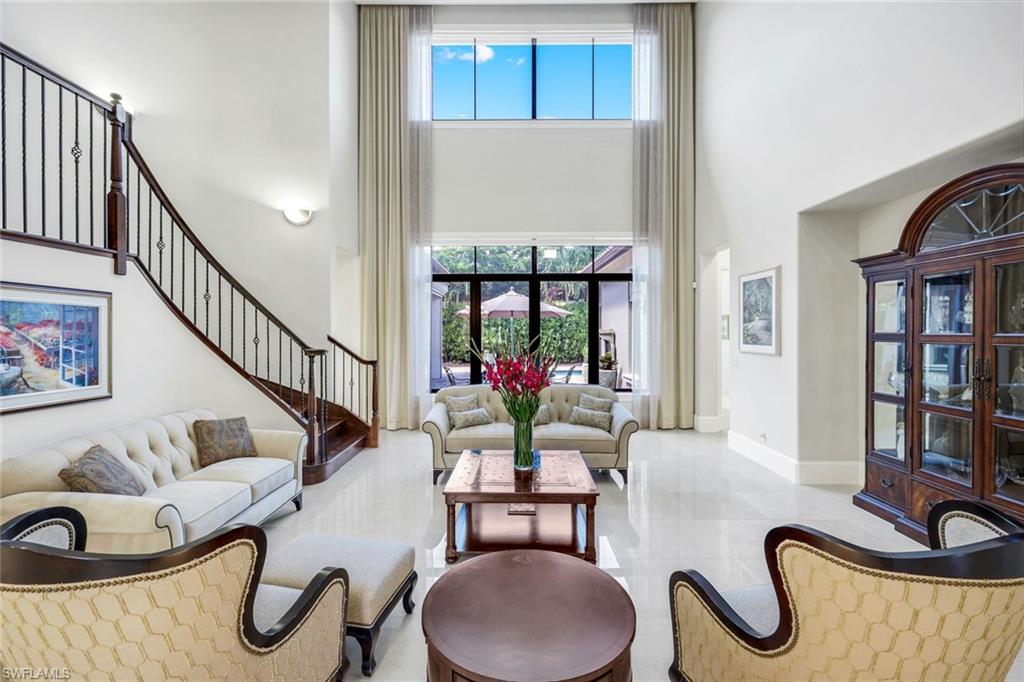 2351 Traditions Court Naples, FL 34105 - Photo 3 of 48 a living room with furniture