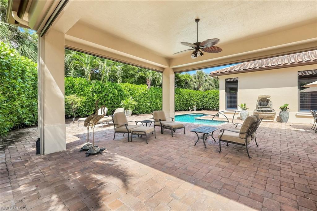 2351 Traditions Court Naples, FL 34105 - Photo 39 of 48 a view of a dining room with furniture window and outside view