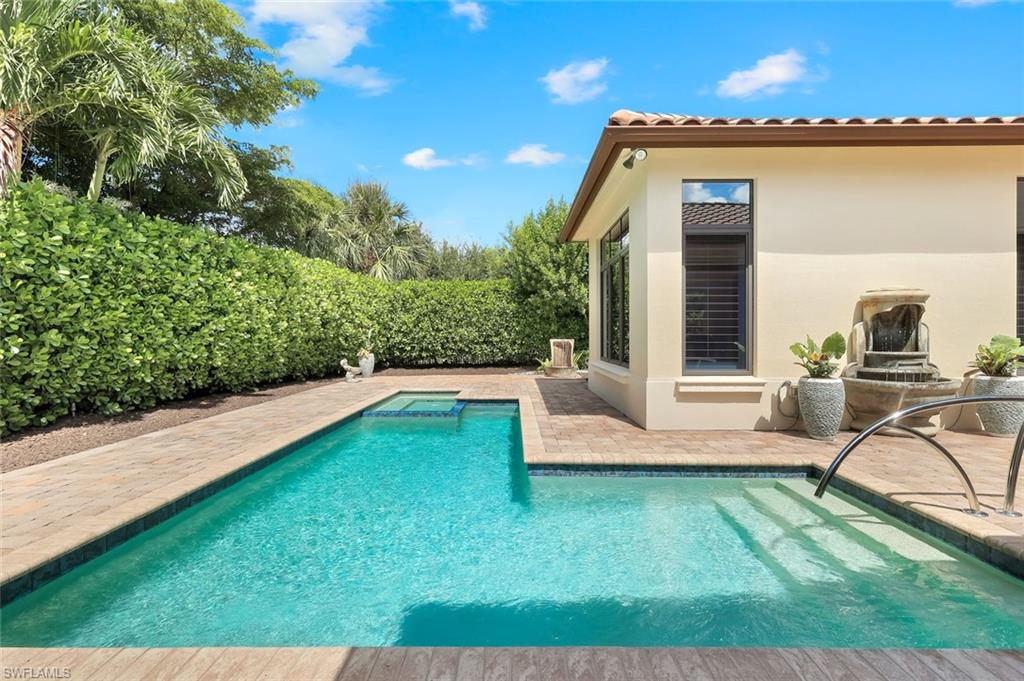 2351 Traditions Court Naples, FL 34105 - Photo 40 of 48 a view of a house with backyard