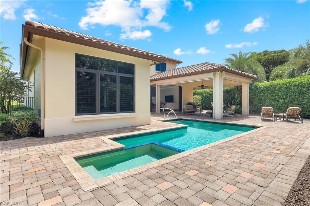 2351 Traditions Court Naples, FL 34105 - Photo 45 of 48 a house view with a garden space