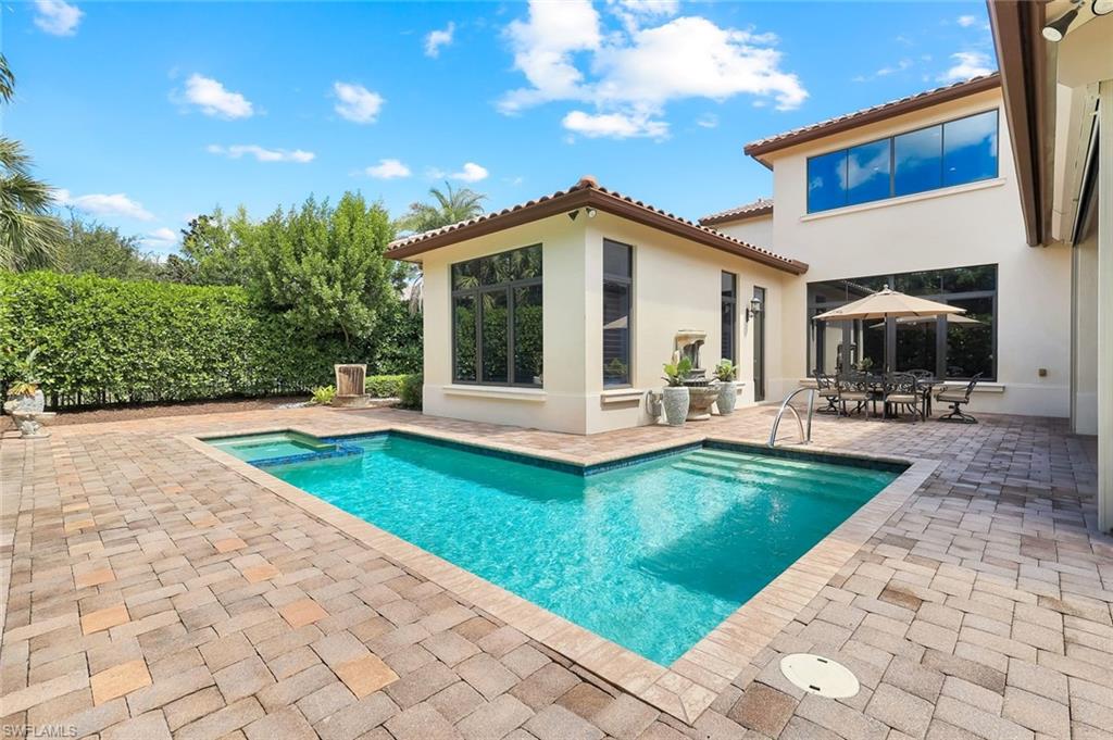 2351 Traditions Court Naples, FL 34105 - Photo 47 of 48 a view of a house with backyard and porch