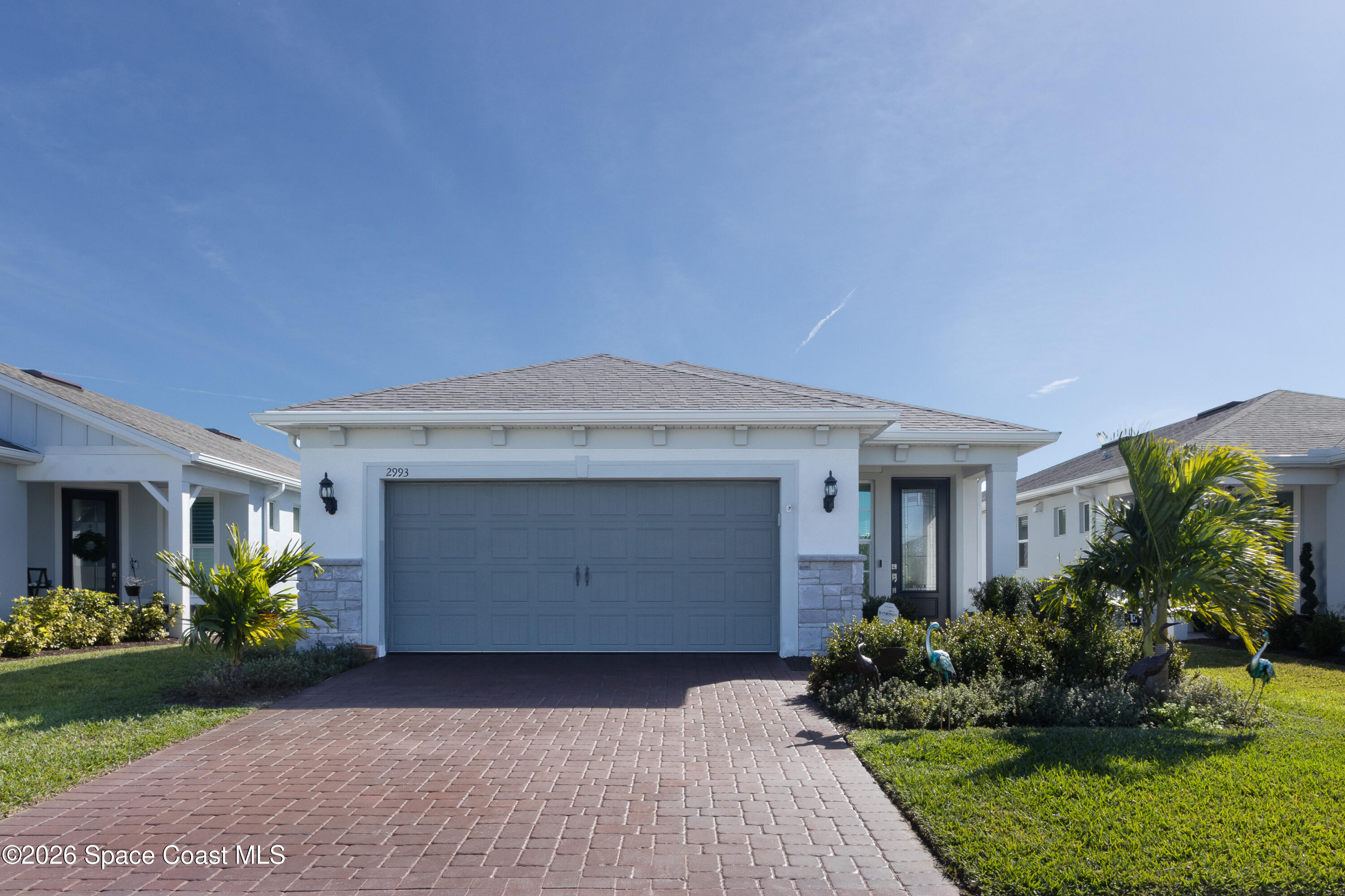 2993 Tidepool Place Melbourne, FL 32940 - Photo 1 of 50 a front view of house with garden