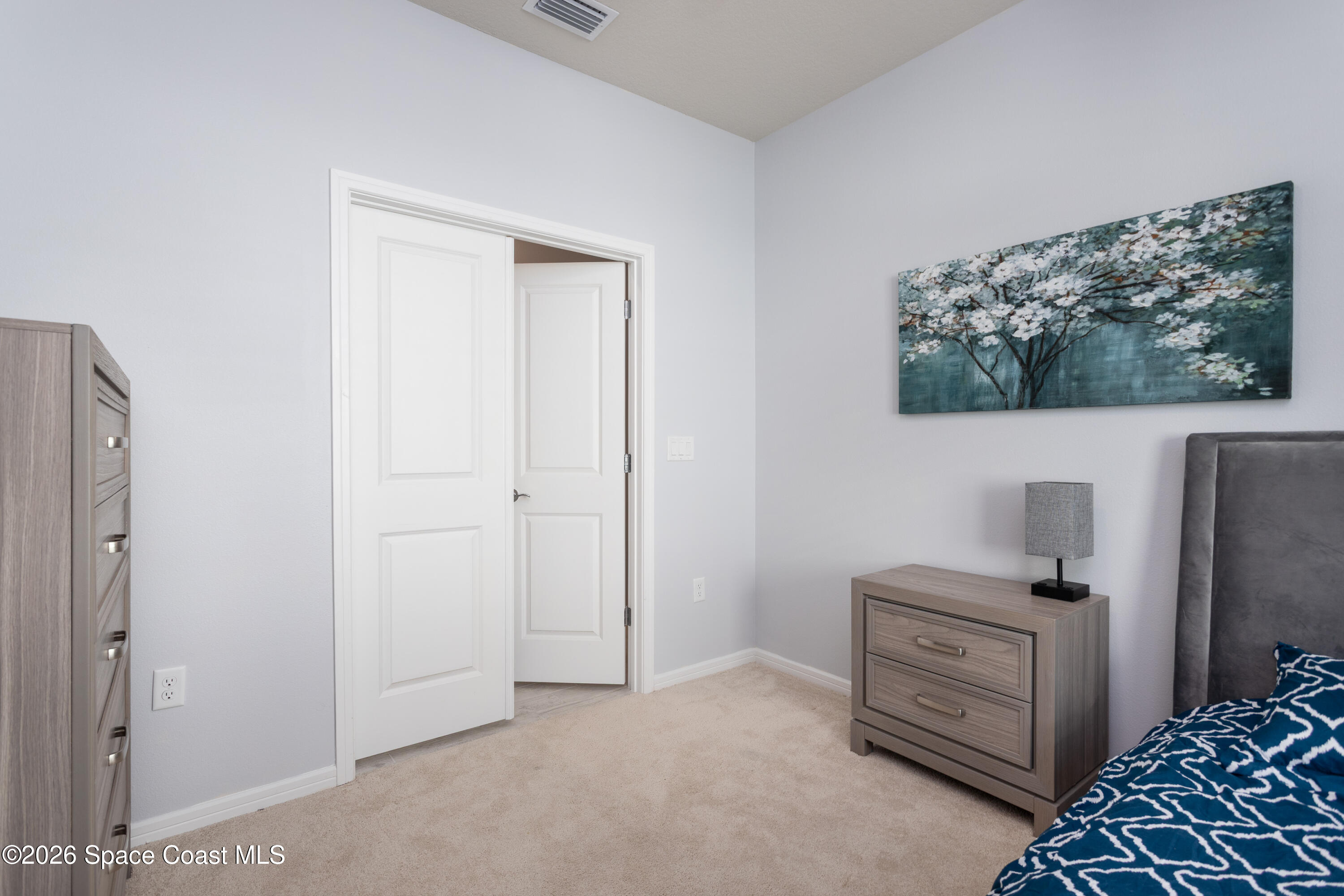 2993 Tidepool Place Melbourne, FL 32940 - Photo 23 of 50 a room with storage and utility