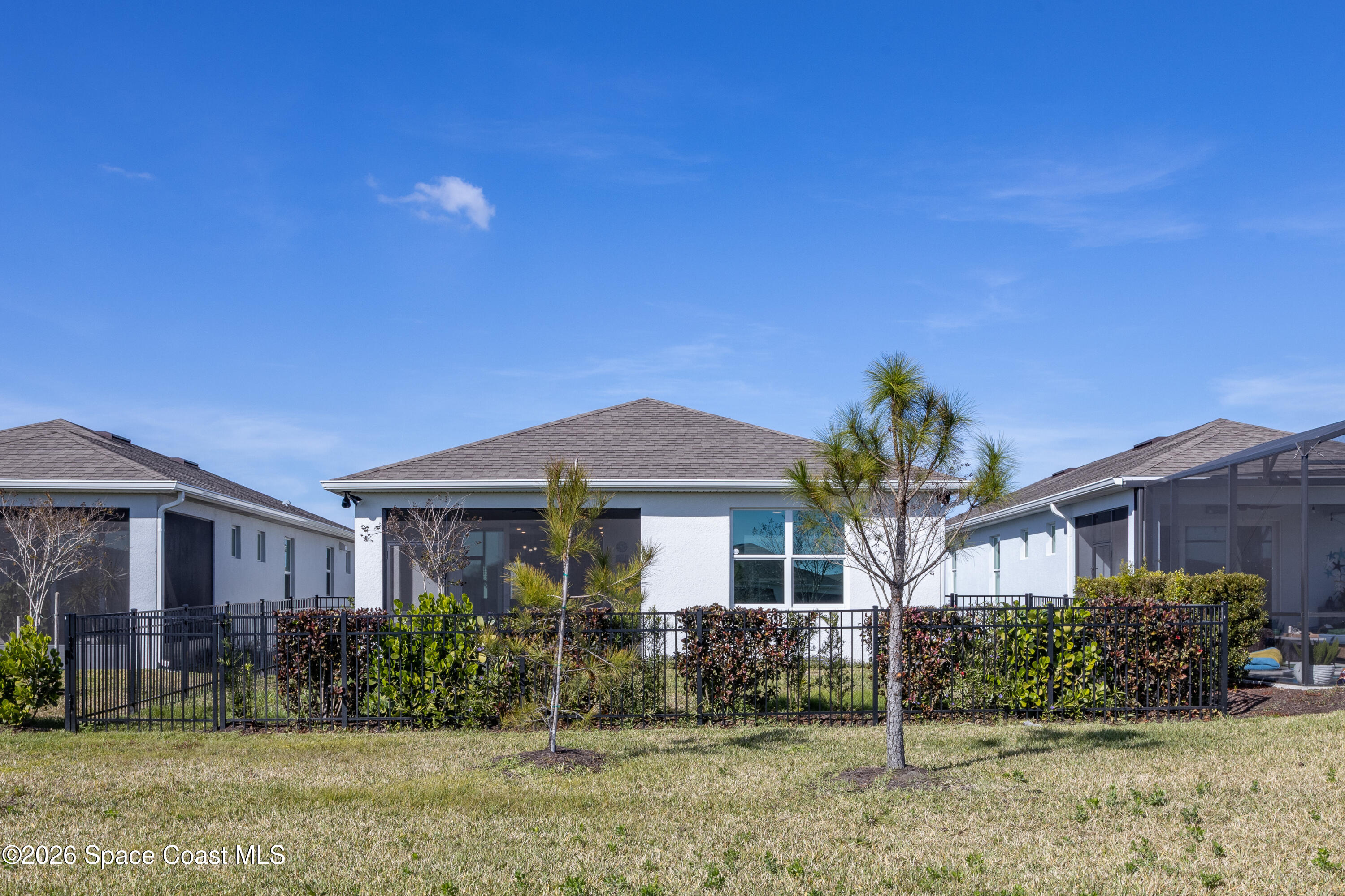 2993 Tidepool Place Melbourne, FL 32940 - Photo 28 of 50 a front view of a house with a yard