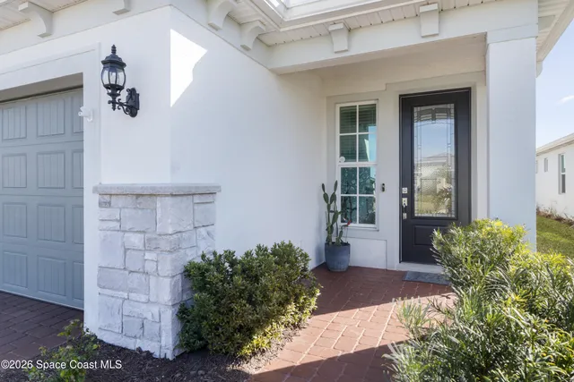 a view of a entryway door of the house