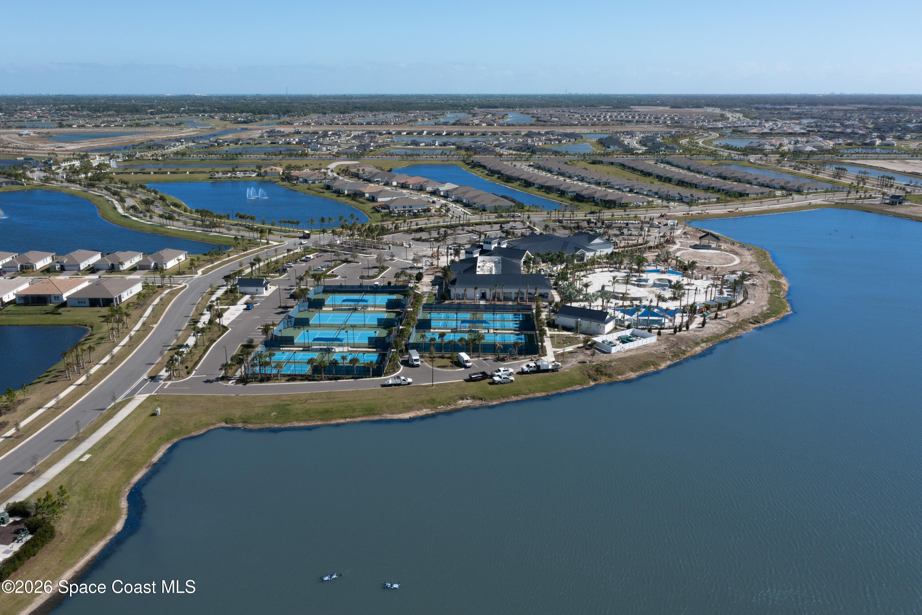 2993 Tidepool Place Melbourne, FL 32940 - Photo 44 of 50 an aerial view of a residential building with an ocean view