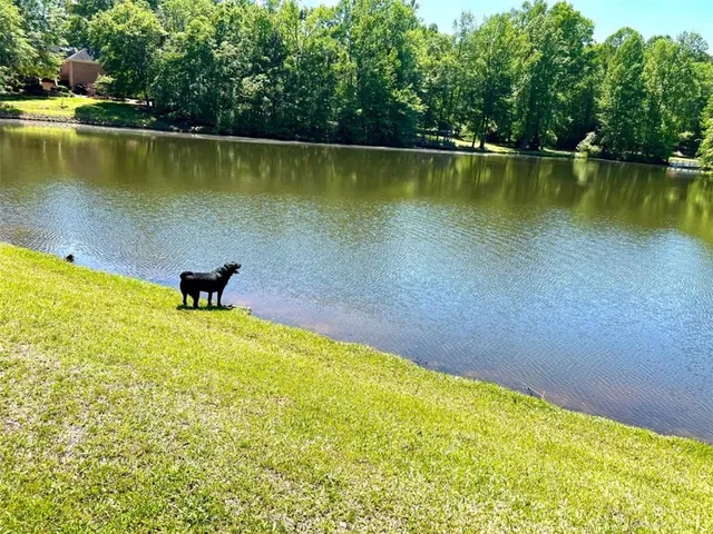a view of a lake with a outdoor space