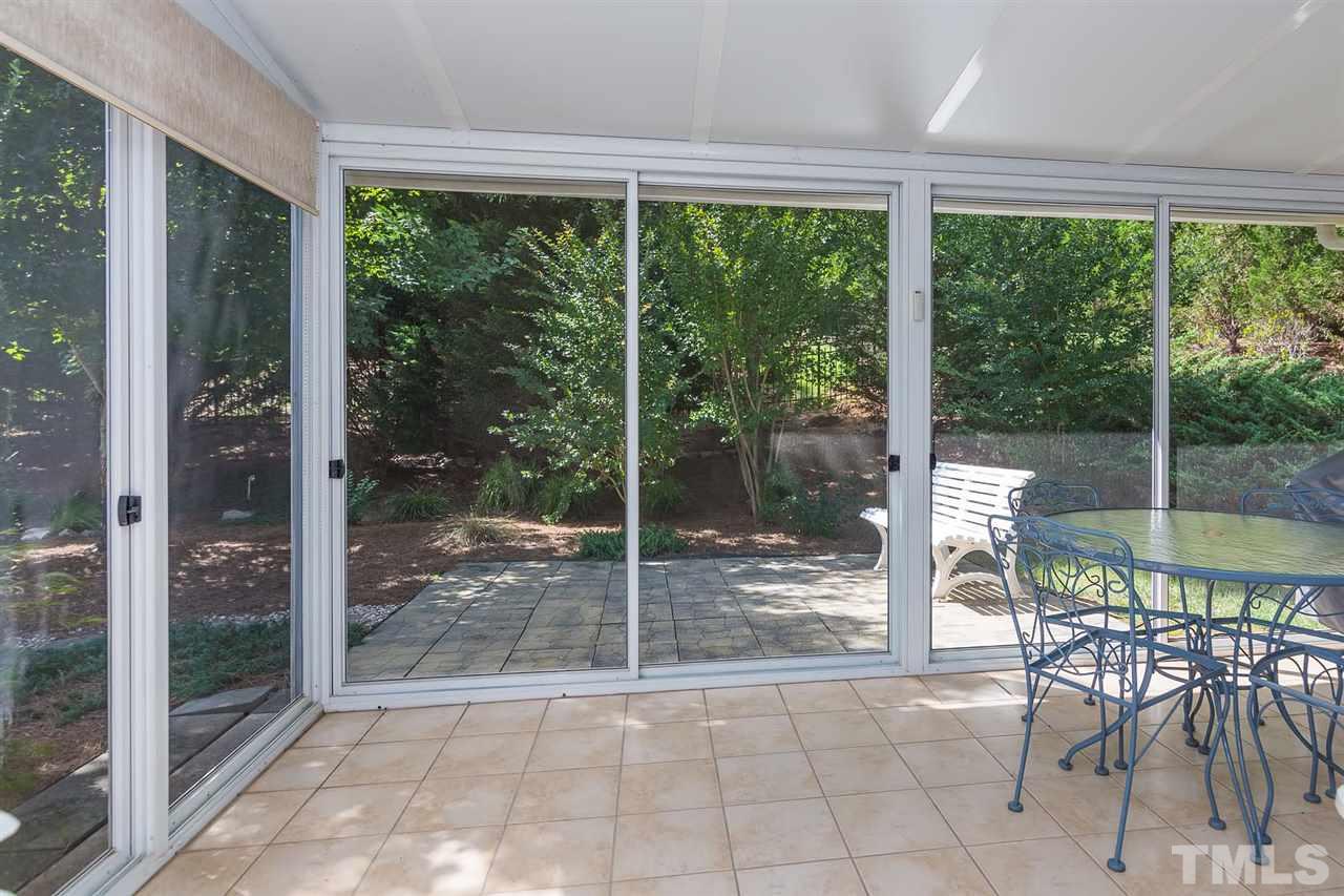 3413 Secretariat Way Raleigh, NC 27614 - Photo 18 of 23 a view of a room with a dining table and chairs