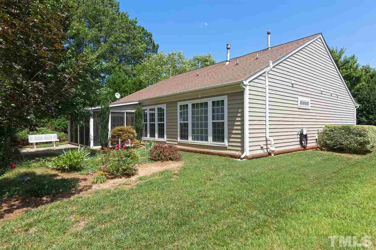 3413 Secretariat Way Raleigh, NC 27614 - Photo 23 of 23 a view of a house with a back yard