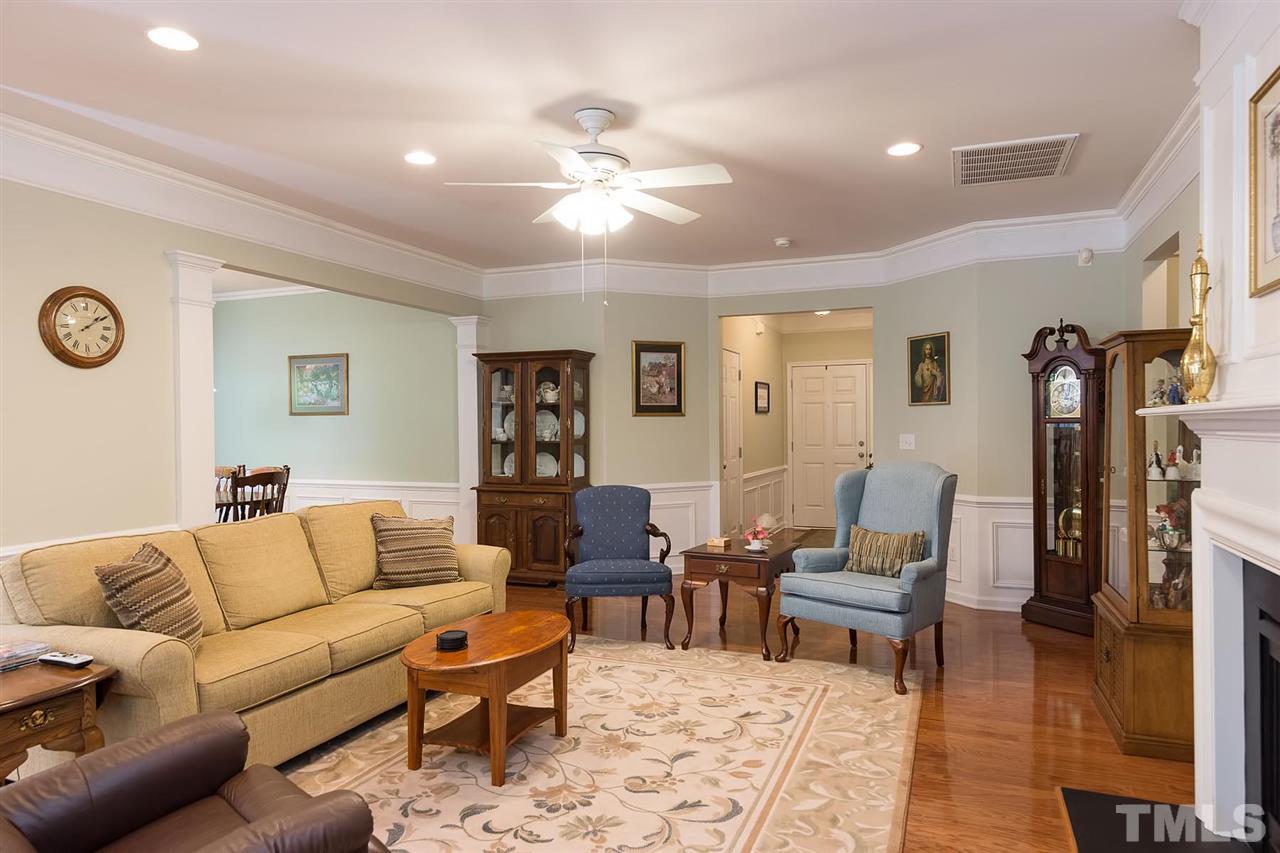3413 Secretariat Way Raleigh, NC 27614 - Photo 4 of 23 a living room with furniture and wooden floor