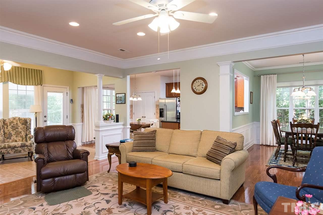 3413 Secretariat Way Raleigh, NC 27614 - Photo 5 of 23 a living room with furniture and a large window