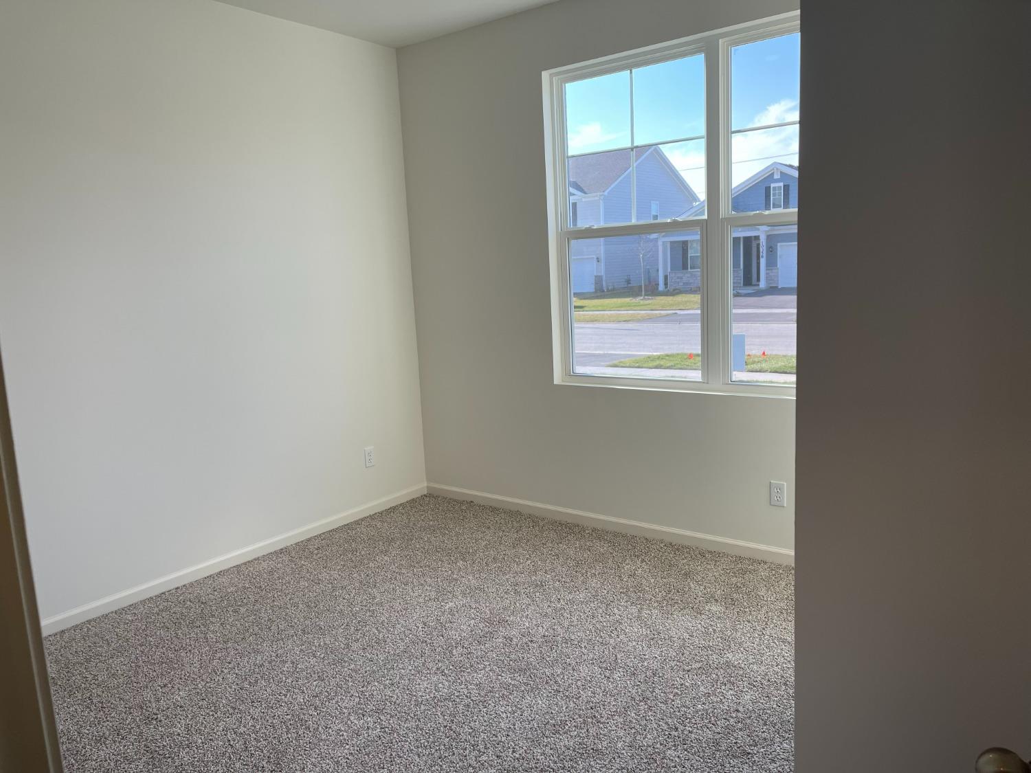 7754 West 103rd Street St. John, IN 46307 - Photo 23 of 39 an empty room with a window
