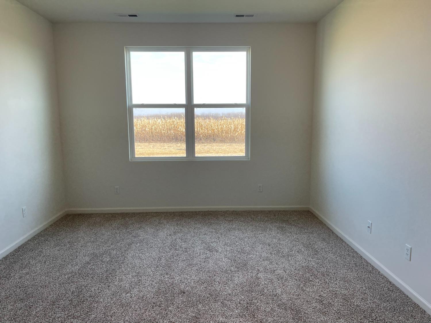 7754 West 103rd Street St. John, IN 46307 - Photo 30 of 39 an empty room with a window