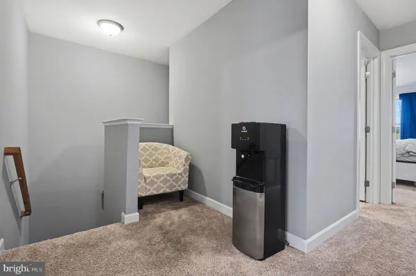 a view of hallway with livingroom