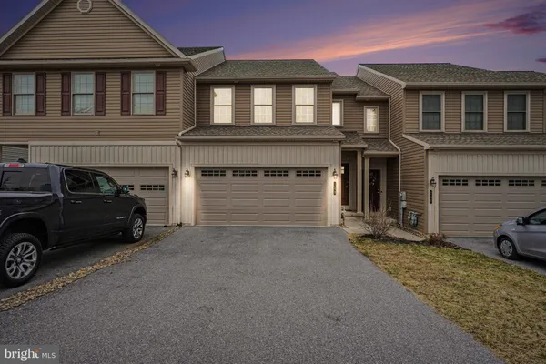 a car parked in front of a house