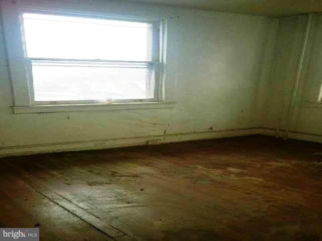 4920 Belair Road Baltimore, MD 21206 - Photo 14 of 16 a view of a room that has a window