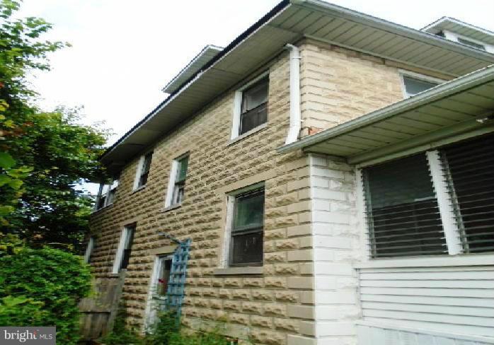 4920 Belair Road Baltimore, MD 21206 - Photo 6 of 16 a view of a house with a window