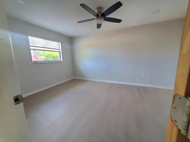 a kitchen with stainless steel appliances granite countertop a sink stove and microwave