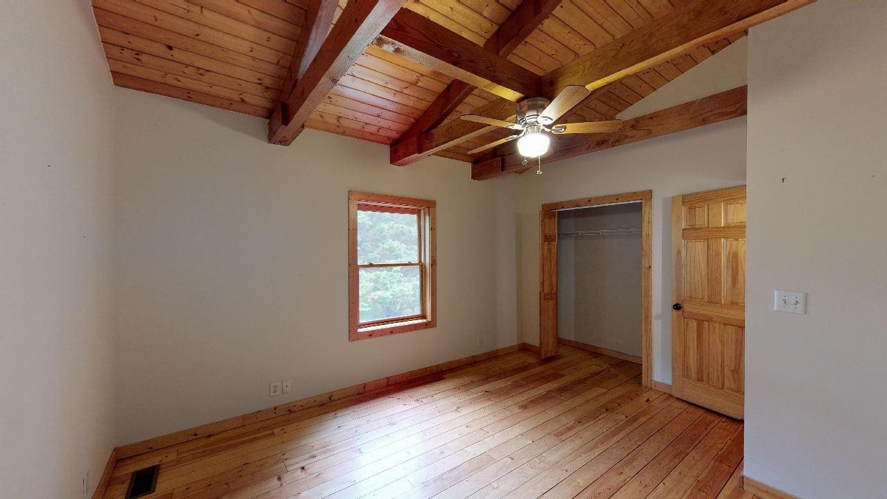 3095 Lower River Road Northwest Georgetown, TN 37336 - Photo 13 of 25 a view of empty room with wooden floor and fan