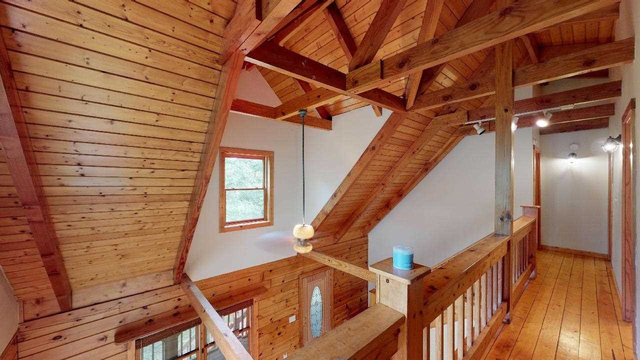 3095 Lower River Road Northwest Georgetown, TN 37336 - Photo 20 of 25 a view of an entryway with wooden floor and stairs