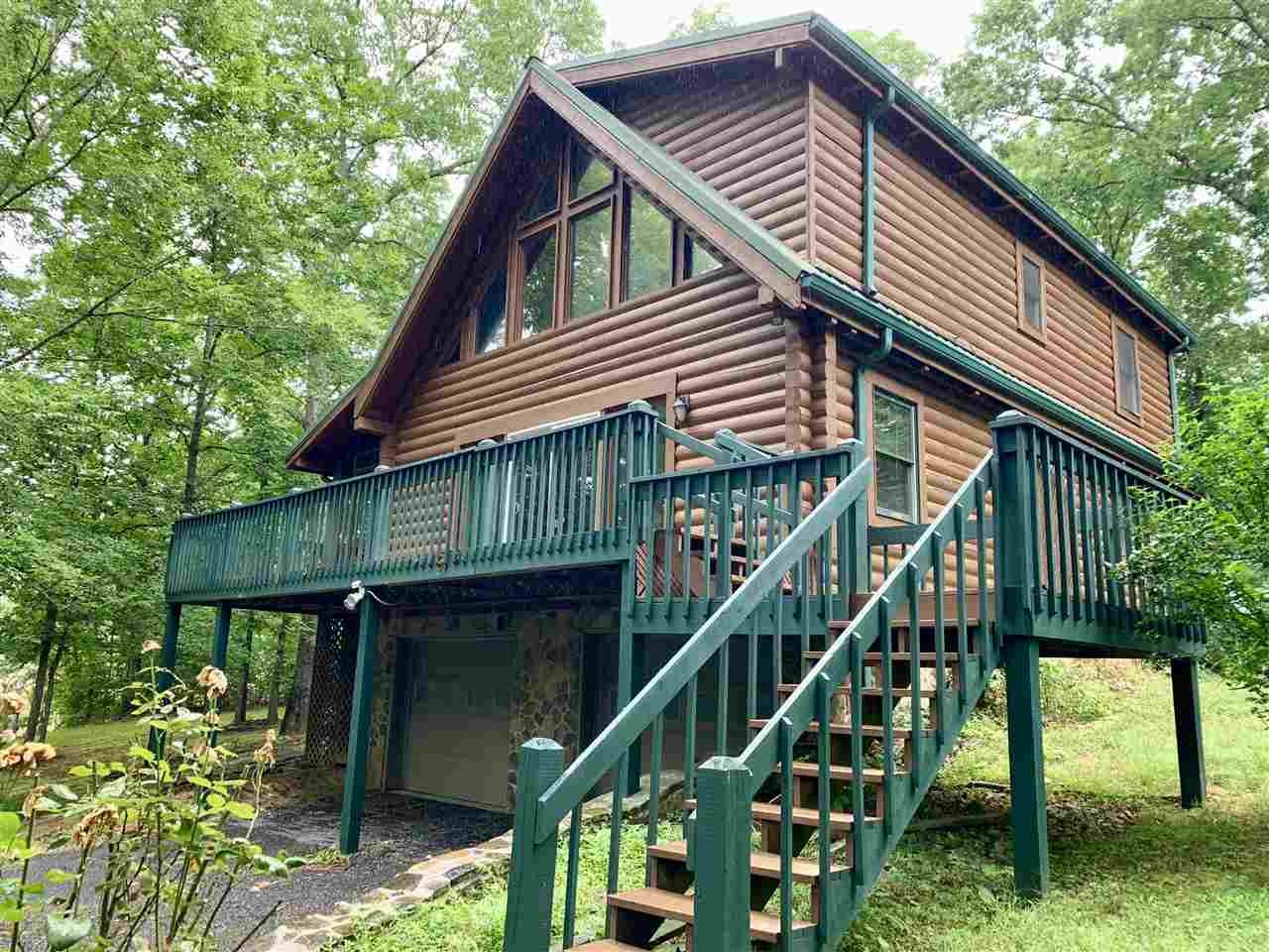 3095 Lower River Road Northwest Georgetown, TN 37336 - Photo 2 of 25 a view of house with wooden deck and furniture