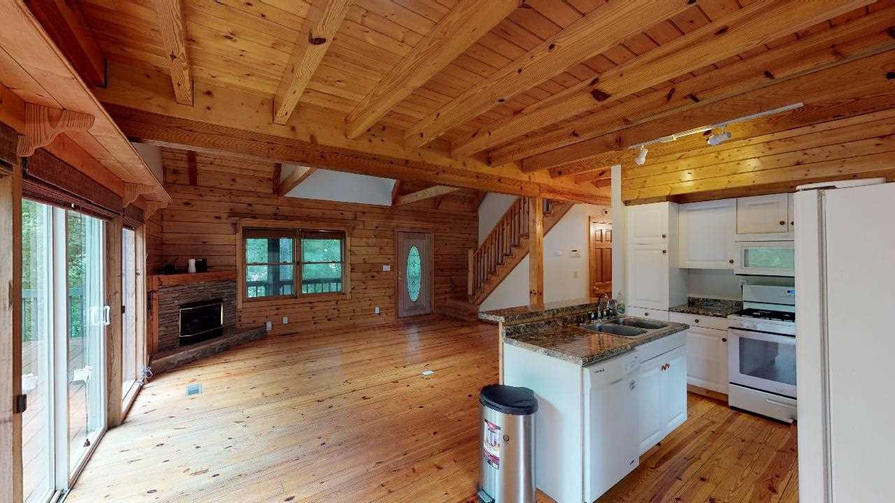 3095 Lower River Road Northwest Georgetown, TN 37336 - Photo 8 of 25 a open kitchen with stove and refrigerator