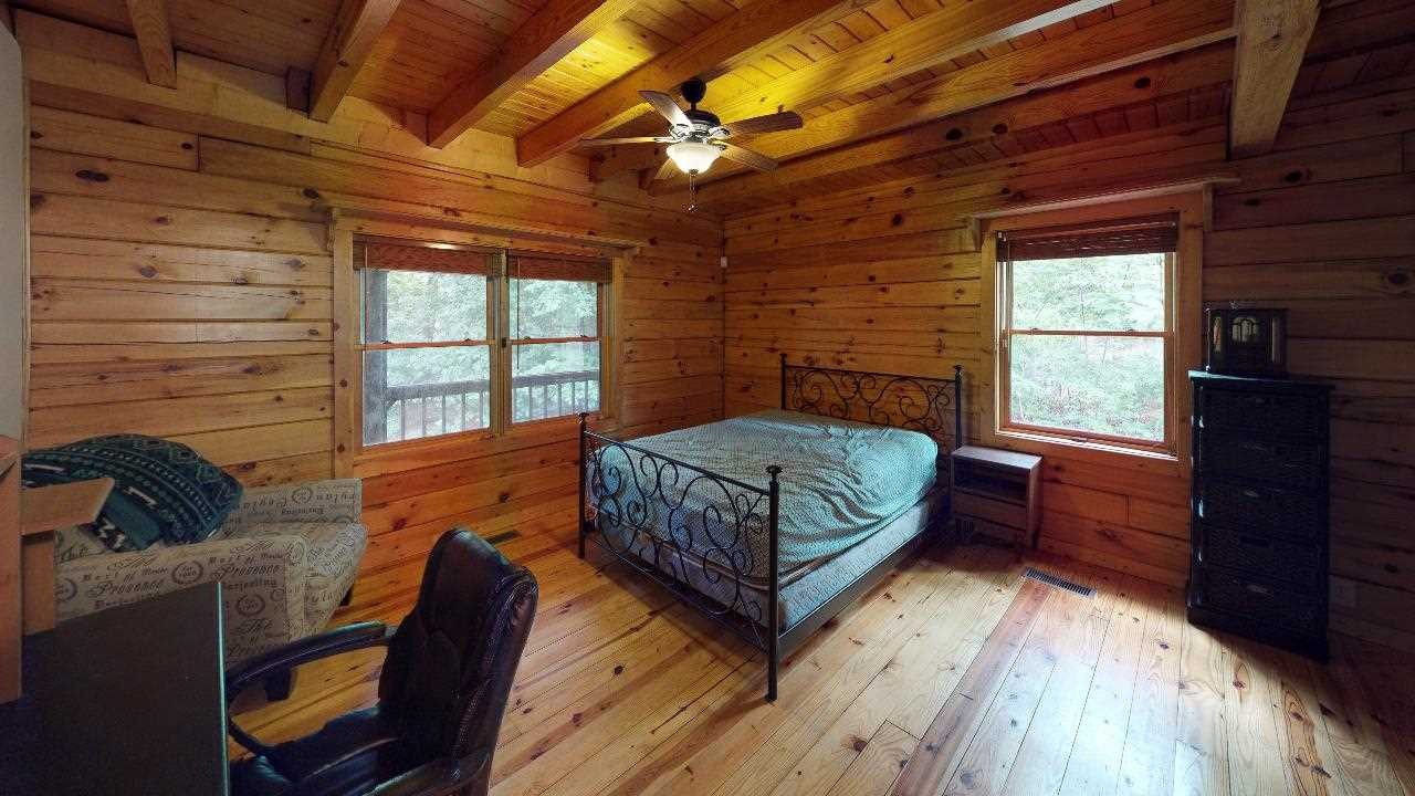 3095 Lower River Road Northwest Georgetown, TN 37336 - Photo 9 of 25 a bedroom with a bed and a window