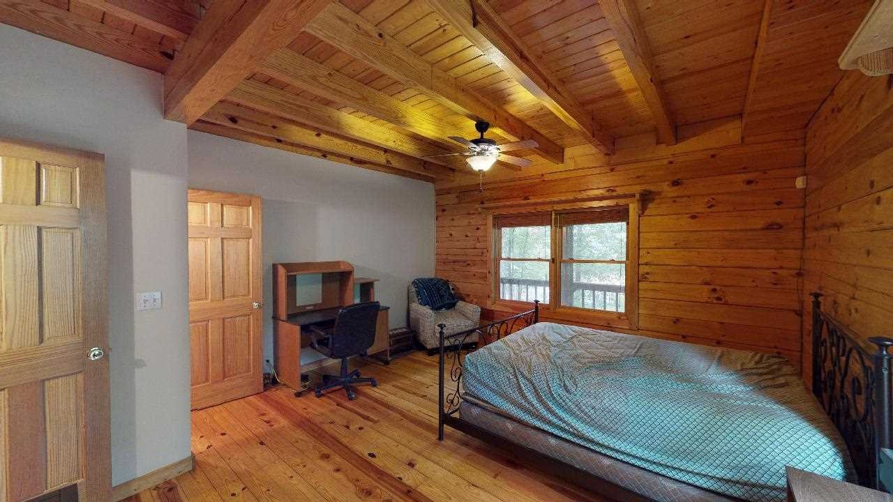 3095 Lower River Road Northwest Georgetown, TN 37336 - Photo 10 of 25 a bedroom with furniture and a window