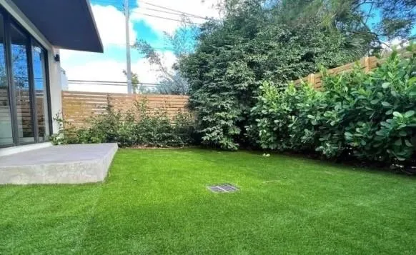 a view of a backyard with garden