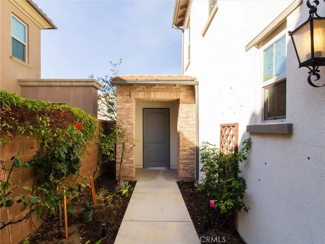a entryway with flower pots