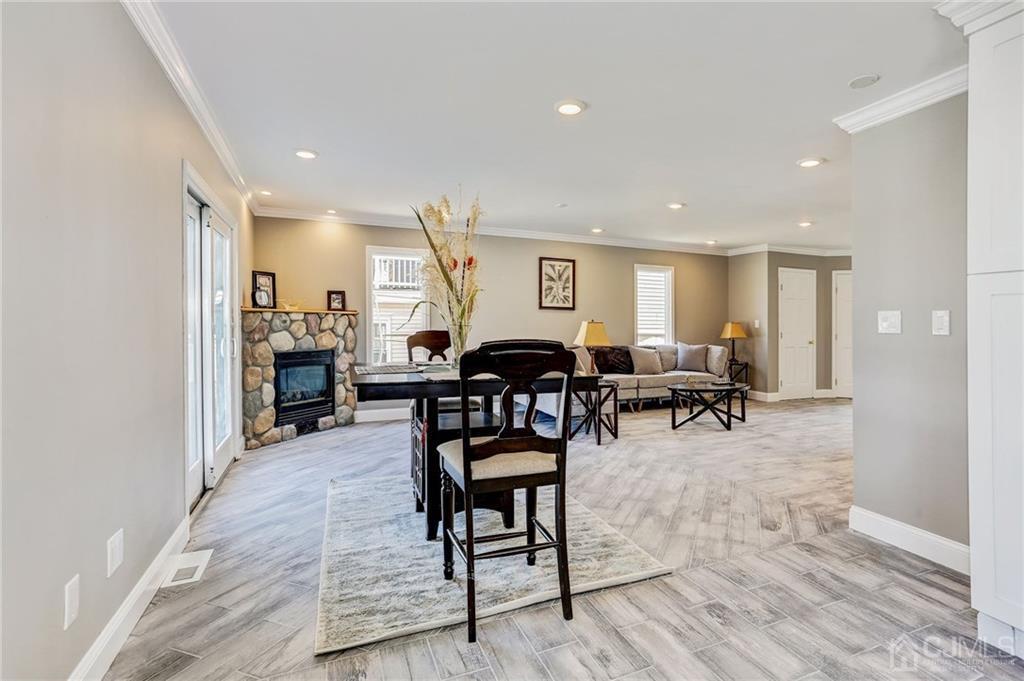 247 Raritan Boulevard Old Bridge, NJ 07735 - Photo 8 of 25 a living room with furniture and wooden floor