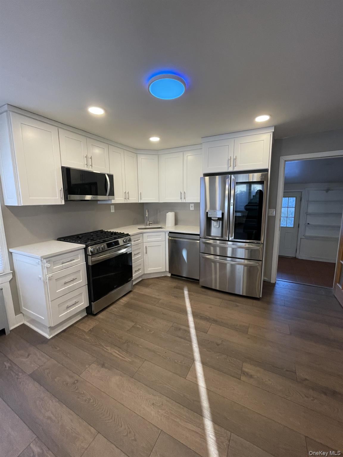 New kitchen with granite counters and Stainless applicances