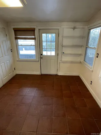 a utility room with washer and dryer