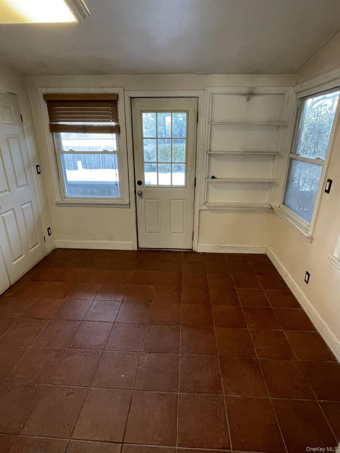 41 Ostend Road Island Park, NY 11558 - Photo 11 of 13 3 season room with yard access