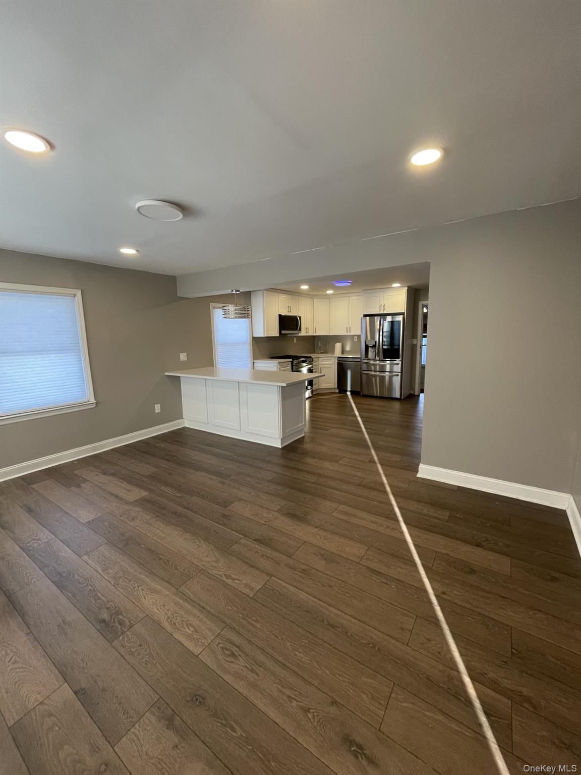 41 Ostend Road Island Park, NY 11558 - Photo 13 of 13 Open floor plan Living room/Dining area
