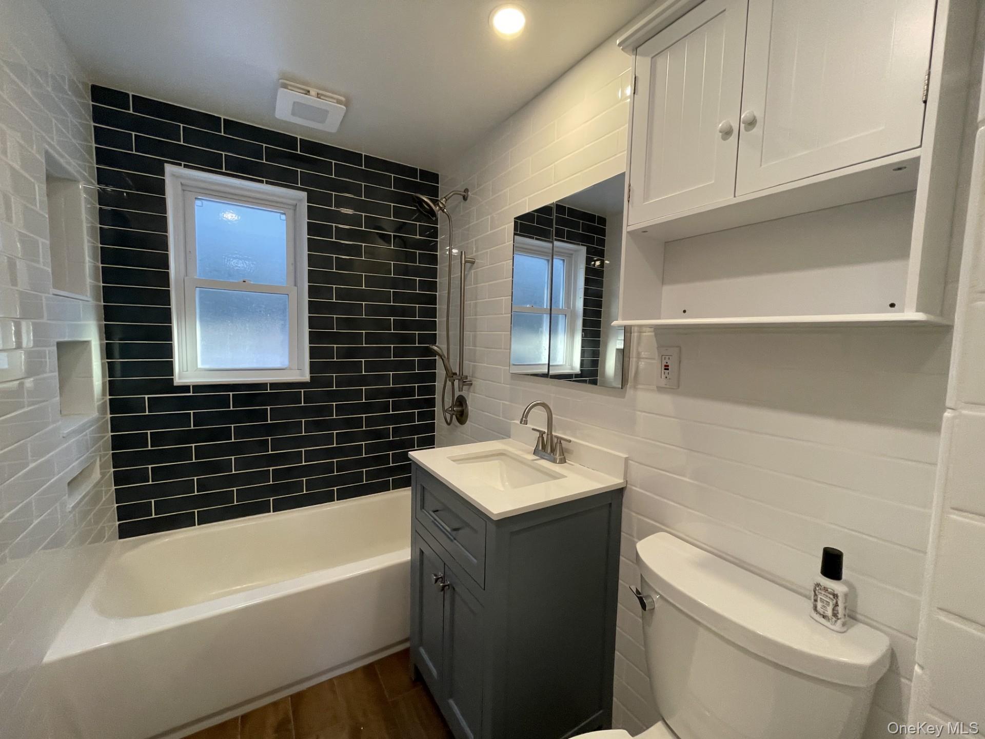 41 Ostend Road Island Park, NY 11558 - Photo 9 of 13 New full bath with Tub