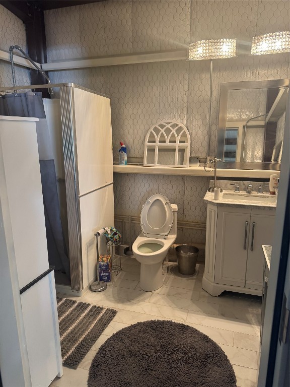 16375 Grand Flower Road Plantersville, TX 77363 - Photo 13 of 25 a bathroom with a sink a toilet a mirror and shower