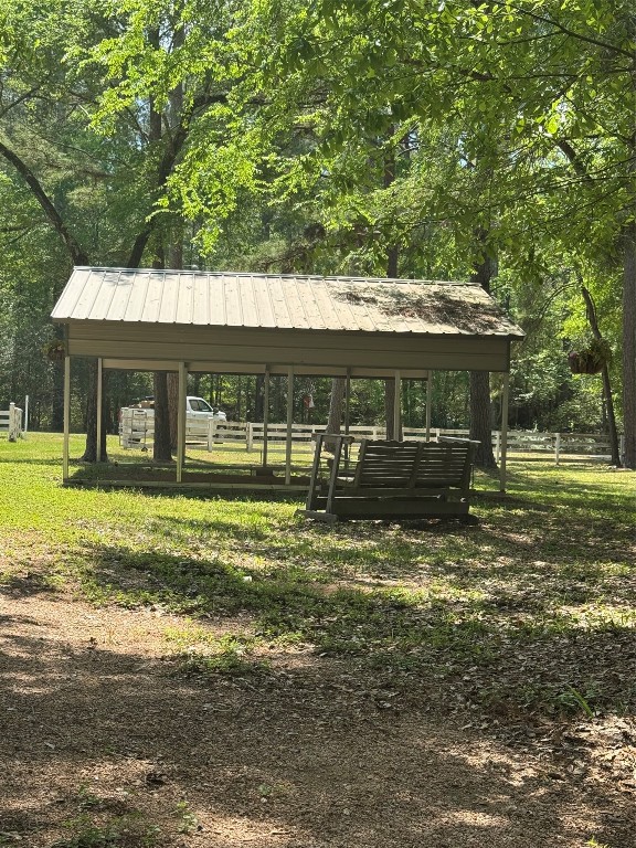 16375 Grand Flower Road Plantersville, TX 77363 - Photo 17 of 25 a view of a house with a yard