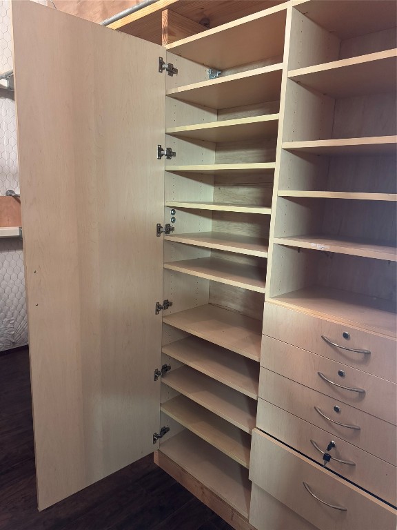 16375 Grand Flower Road Plantersville, TX 77363 - Photo 23 of 25 a view of walk in closet with empty racks