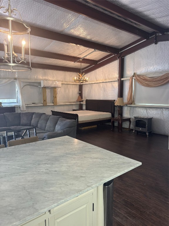 16375 Grand Flower Road Plantersville, TX 77363 - Photo 9 of 25 a room with wooden floor and furniture