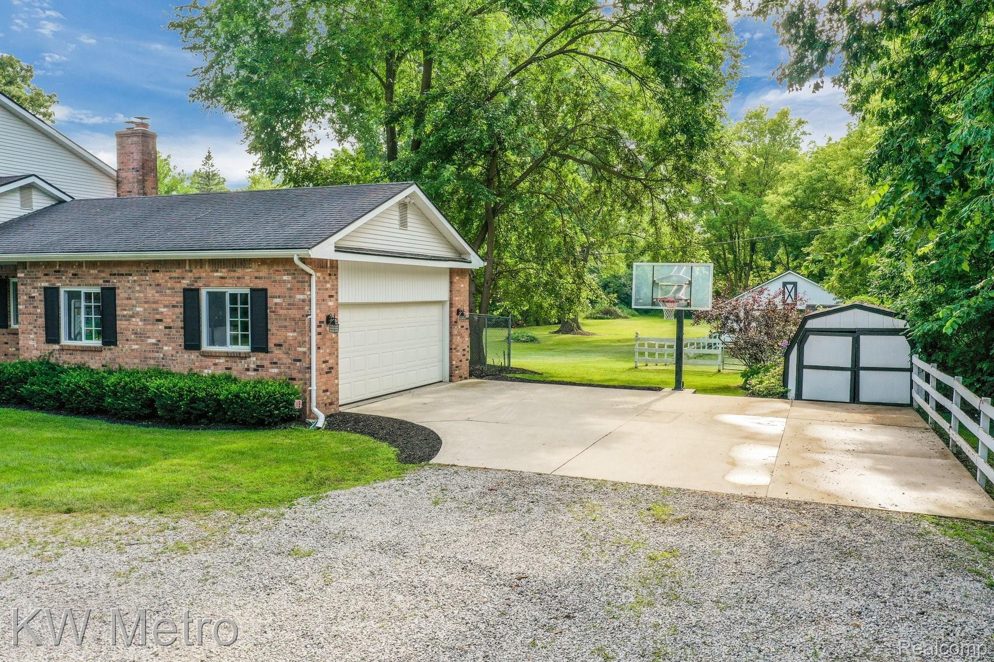 28291 Martindale Road New Hudson, MI 48165 - Photo 9 of 96 28291+Martindale+Rd+Lyon+Charter+Township-12-web.jpg