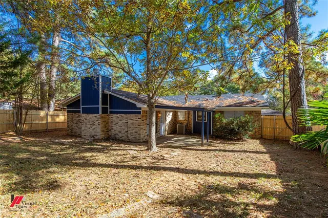 a house with trees in front of it