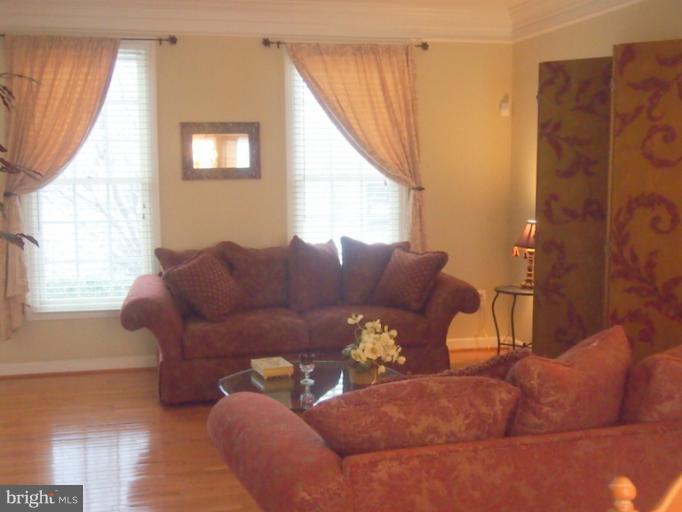 14407 Bubbling Spring Road Boyds, MD 20841 - Photo 14 of 30 a living room with furniture and a window
