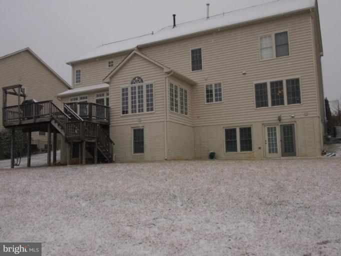 14407 Bubbling Spring Road Boyds, MD 20841 - Photo 22 of 30 a view of a house with a backyard