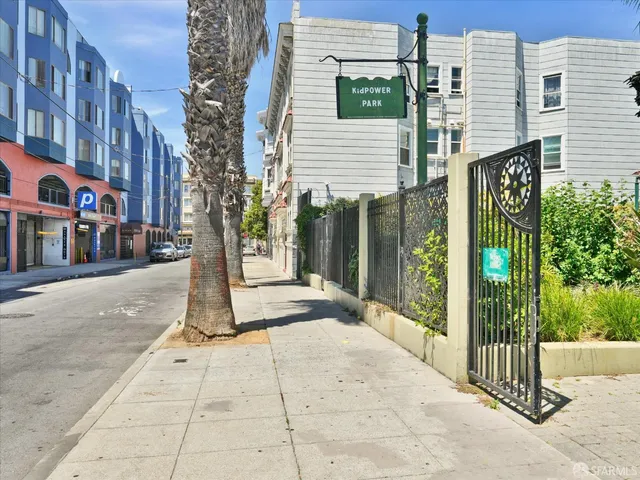 a view of a building with a street