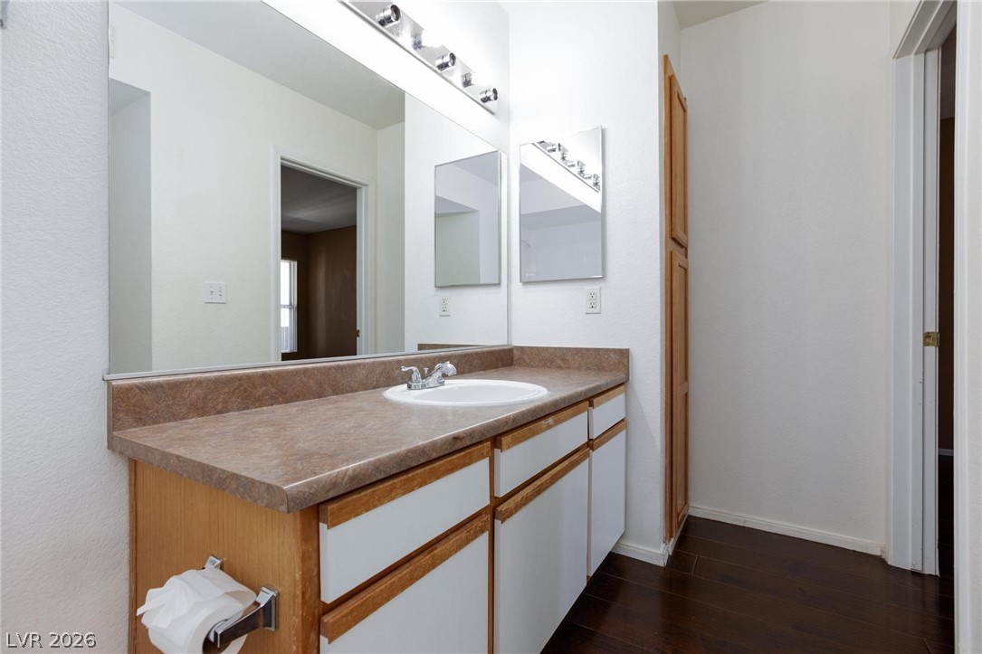 6650 West Warm Springs Road, Unit 2027 Las Vegas, NV 89118 - Photo 19 of 29 This bathroom features a functional vanity with ample storage and a sleek sink.